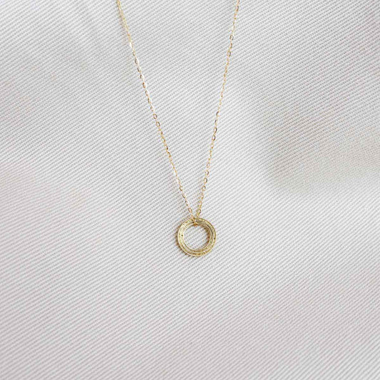 Rhythm Round Pendant & Necklace